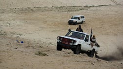 Deep inside caves, in remote desert bases, in the escarpments and cliff faces of northern Mali, Islamic fighters are burrowing into the earth, erecting a formidable set of defenses to protect what has essentially become al-Qaida's new country.